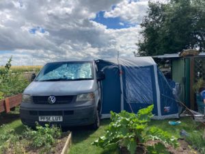 The van with the driveaway tent – a test night in a friend’s garden before setting off on our travel adventure!